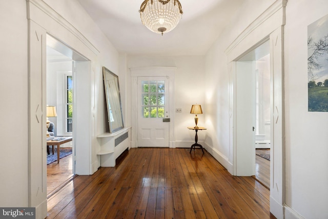 1129 Delaplane Grade Rd, Upperville, VA 20184 - entrance foyer featuring hardwood / wood-style flooring, a chandelier, radiator heating unit, and a baseboard heating unit