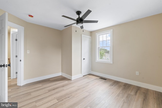 2701 Christopher Ave, Baltimore, MD 21214 - empty room with light wood-type flooring, ceiling fan, and a smoke detector