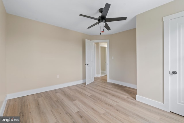2701 Christopher Ave, Baltimore, MD 21214 - unfurnished bedroom with light wood-style floors and a ceiling fan