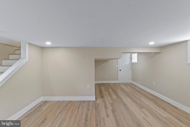 2701 Christopher Ave, Baltimore, MD 21214 - below grade area featuring light wood finished floors, recessed lighting, and stairway