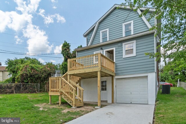 2701 Christopher Ave, Baltimore, MD 21214 - view of front of home with an attached garage, a gambrel roof, a deck, stairway, and driveway