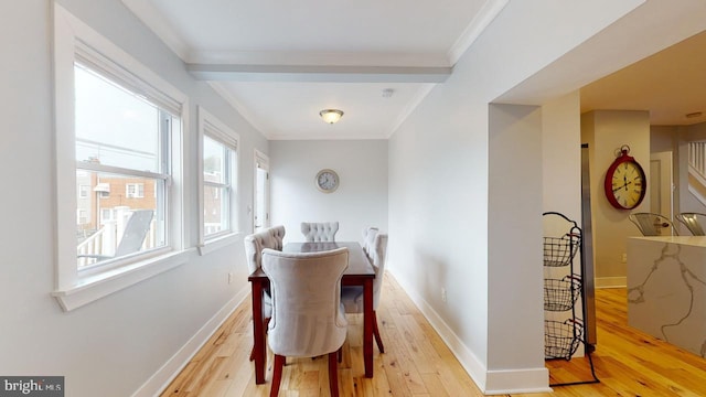 4914 3rd St NW, Washington, DC 20011 - dining space with light wood finished floors, crown molding, and baseboards