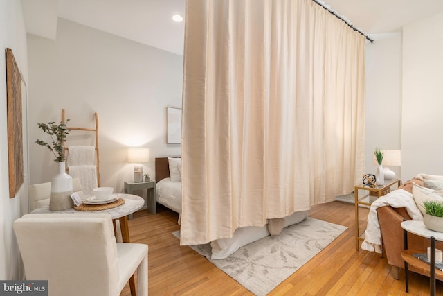 bedroom featuring light wood-style floors