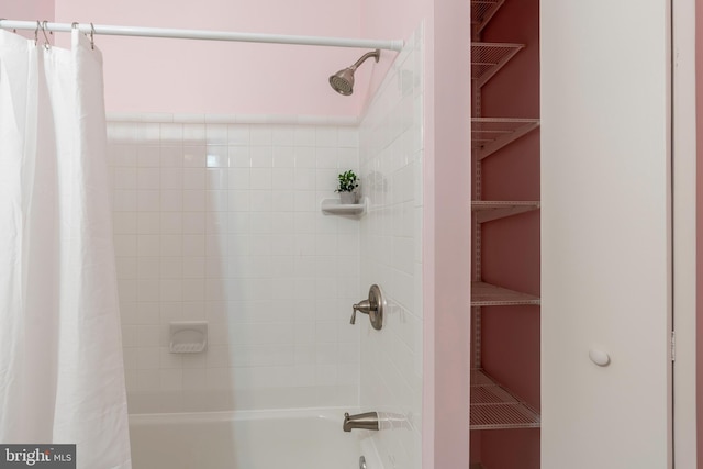 full bathroom with shower / bath combo with shower curtain