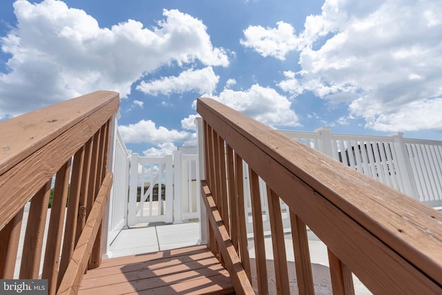view of community with a wooden deck