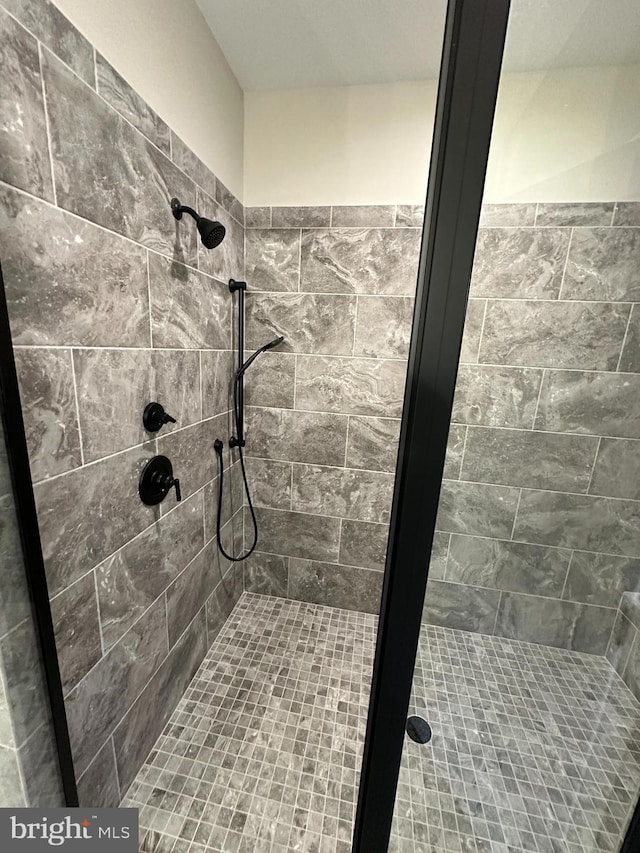 bathroom featuring a stall shower