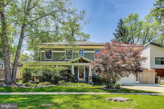 3906 Halsey St, Kensington, MD 20895 - view of front of home with concrete driveway, a front lawn, board and batten siding, and a garage