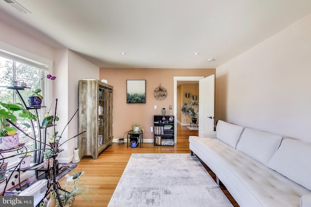 3906 Halsey St, Kensington, MD 20895 - living room with light wood finished floors, recessed lighting, and baseboards