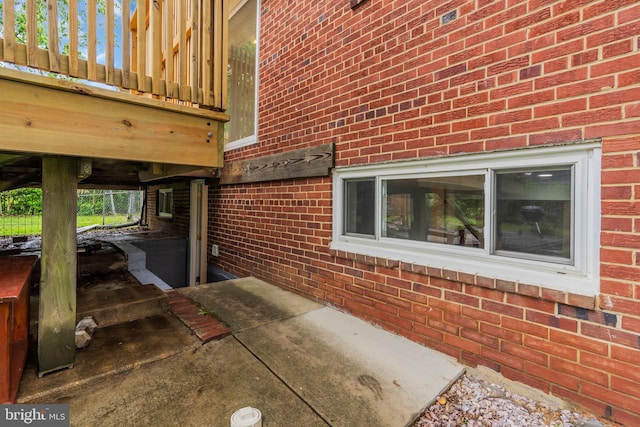 exterior space with brick siding
