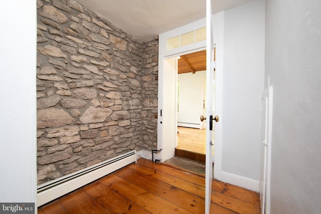2957 River Rd, New Hope, PA 18938 - corridor with hardwood / wood-style floors and a baseboard heating unit