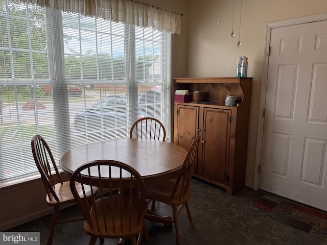 dining space with baseboards