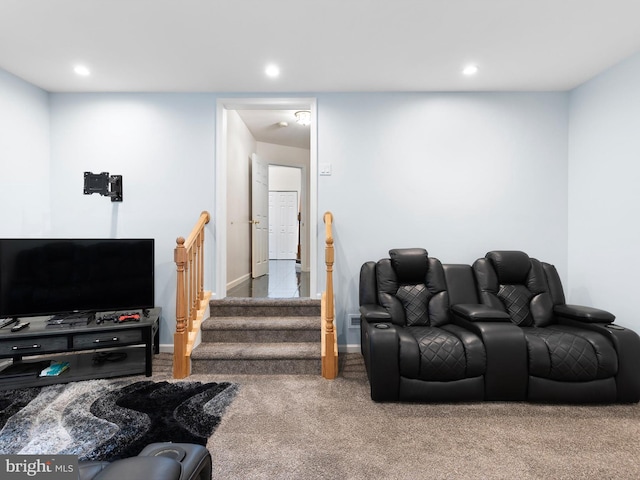 living room with baseboards, recessed lighting, and carpet