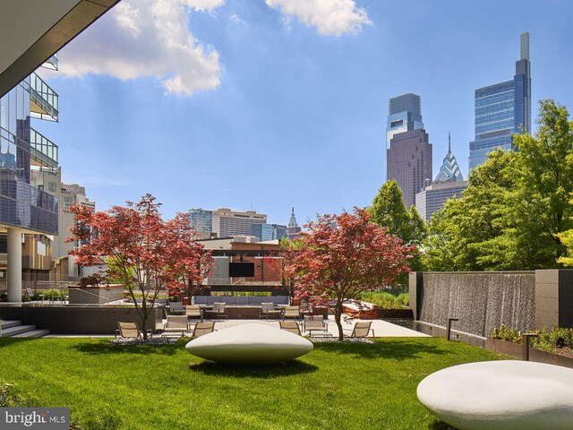 2100 Hamilton St Unit 2D, Philadelphia, PA 19130 - view of community with a city view, a yard, and an outdoor hangout area
