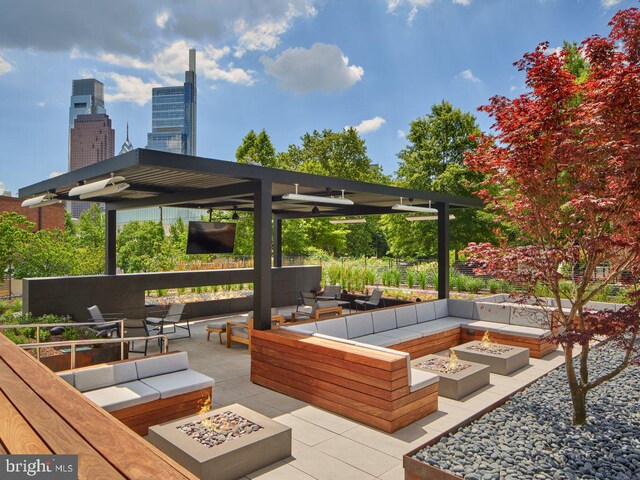 2100 Hamilton St Unit 2D, Philadelphia, PA 19130 - view of patio with an outdoor living space with a fire pit