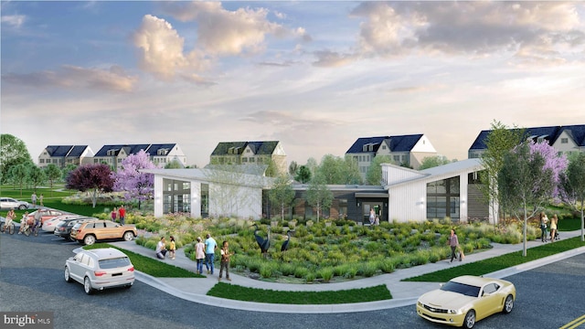 view of home's community featuring uncovered parking