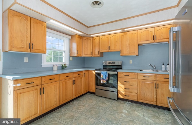 kitchen with a sink, stainless steel appliances, visible vents, crown molding, and light countertops