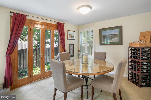 6018 Good Lion Ct, Alexandria, VA 22315 - dining area with light carpet, french doors, and baseboards