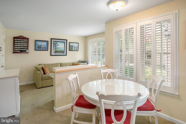 6018 Good Lion Ct, Alexandria, VA 22315 - dining room featuring baseboards and light carpet