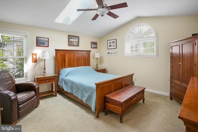 6018 Good Lion Ct, Alexandria, VA 22315 - bedroom with light carpet, lofted ceiling, a skylight, and a ceiling fan