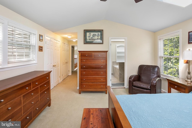 6018 Good Lion Ct, Alexandria, VA 22315 - bedroom with vaulted ceiling, light carpet, and ensuite bath