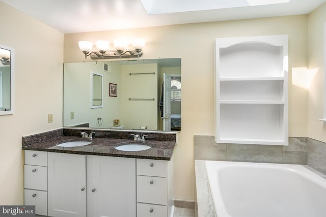 6018 Good Lion Ct, Alexandria, VA 22315 - full bathroom with a garden tub, a skylight, and double vanity