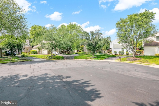 6018 Good Lion Ct, Alexandria, VA 22315 - view of asphalt road featuring a residential view and curbs