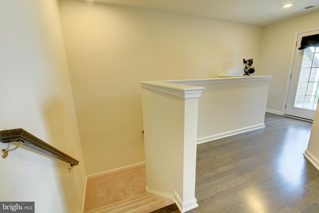 bar featuring baseboards and wood finished floors