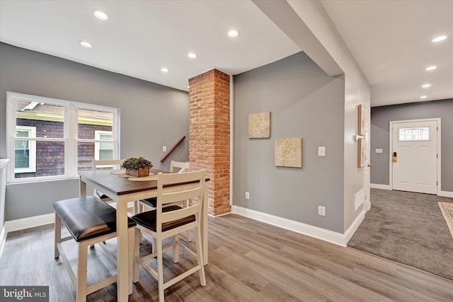 dining area with recessed lighting, baseboards, and light wood-style floors