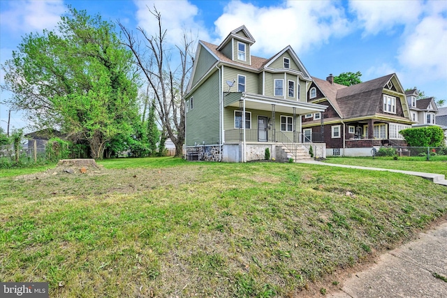 victorian-style house featuring covered porch