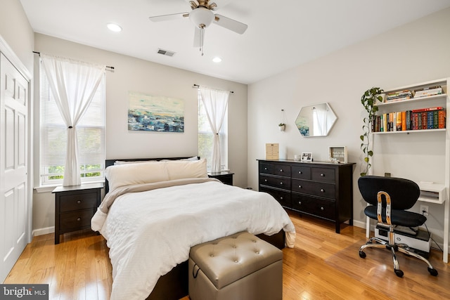 bedroom featuring baseboards, visible vents, light wood-style flooring, and recessed lighting