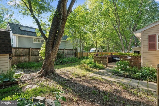 1215 Pine Ave, Shady Side, MD 20764 - fenced backyard with a patio