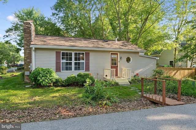 1215 Pine Ave, Shady Side, MD 20764 - view of front of property featuring a chimney and roof with shingles