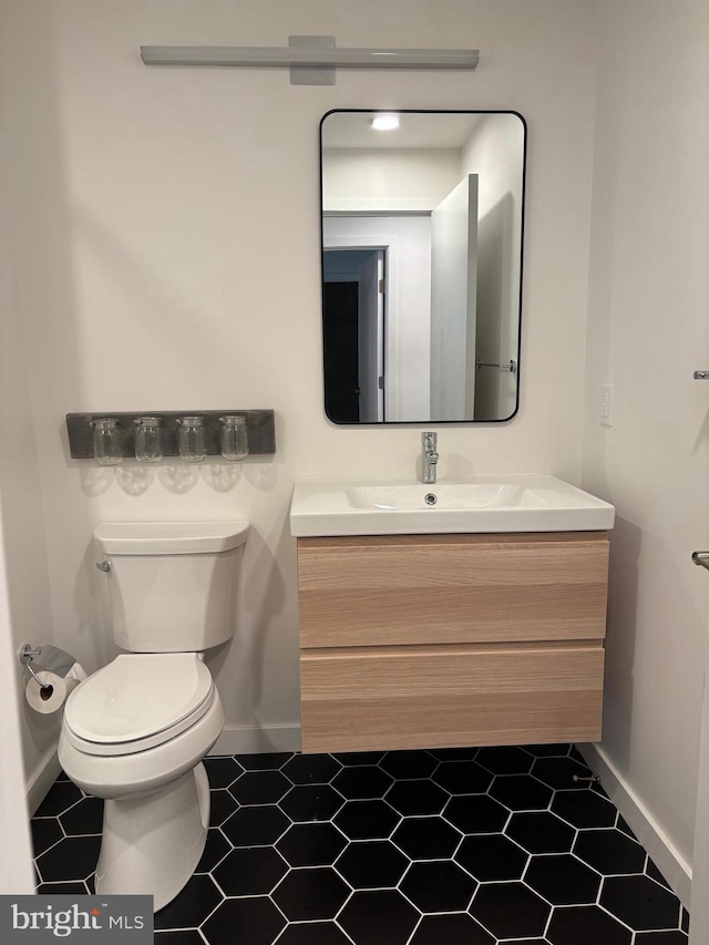 1501 N 31st St Unit 305, Philadelphia, PA 19121 - bathroom with vanity, baseboards, and toilet