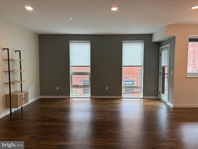 1501 N 31st St Unit 305, Philadelphia, PA 19121 - unfurnished room with healthy amount of natural light, dark wood-style flooring, recessed lighting, and baseboards