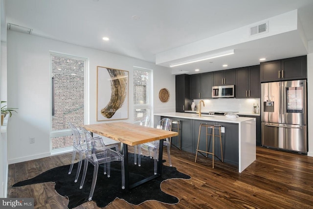 1501 N 31st St Unit 305, Philadelphia, PA 19121 - dining area with dark wood-style floors, recessed lighting, and baseboards