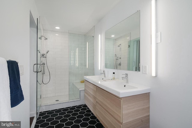 1501 N 31st St Unit 305, Philadelphia, PA 19121 - bathroom featuring tiled shower, tile patterned flooring, double vanity, and recessed lighting