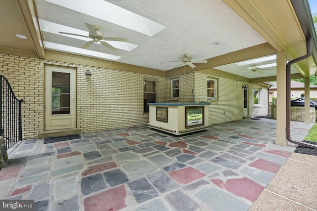 view of patio featuring a ceiling fan