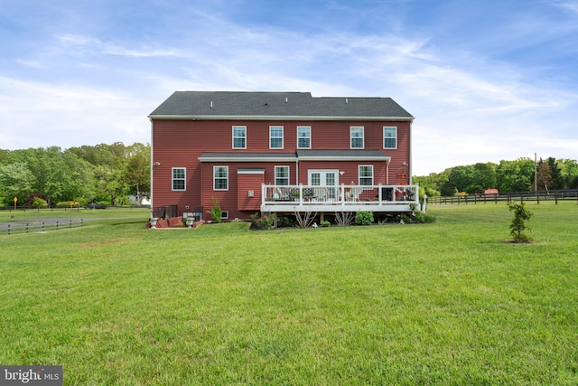 back of house featuring a deck