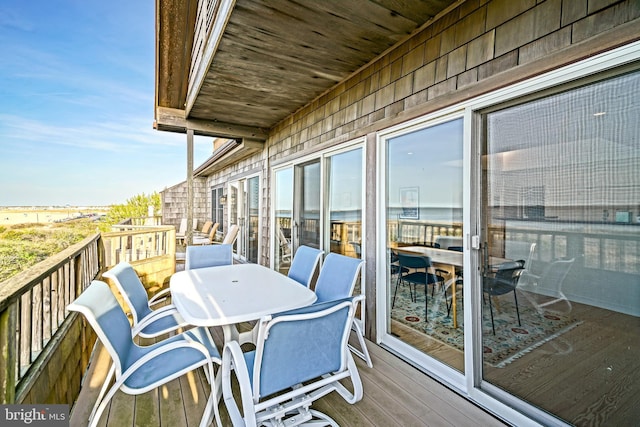 balcony with outdoor dining area