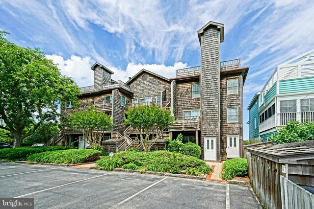 130 Bayview Ave Unit I, Lewes, DE 19958 - view of building exterior featuring uncovered parking