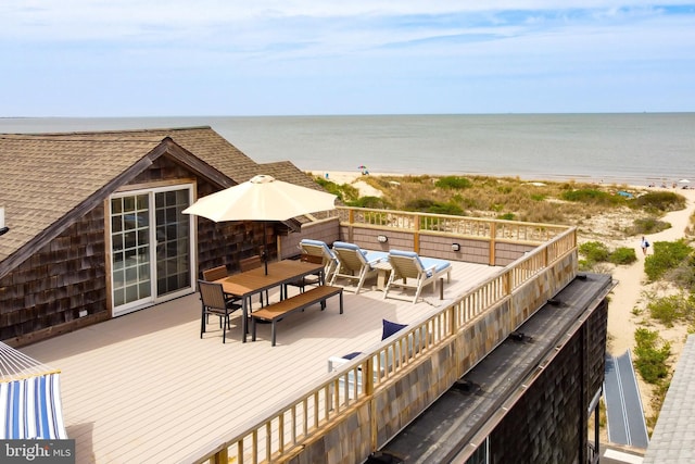130 Bayview Ave Unit I, Lewes, DE 19958 - wooden deck with view of water and beach, outdoor dining space, and outdoor lounge area