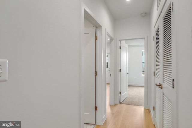 4902 D St SE, Washington, DC 20019 - corridor featuring light wood finished floors and baseboards