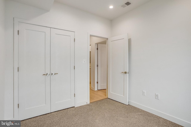 4902 D St SE, Washington, DC 20019 - unfurnished bedroom with carpet, a closet, baseboards, and recessed lighting