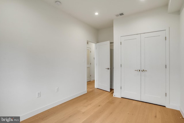 4902 D St SE, Washington, DC 20019 - unfurnished bedroom with light wood-style floors, recessed lighting, and baseboards