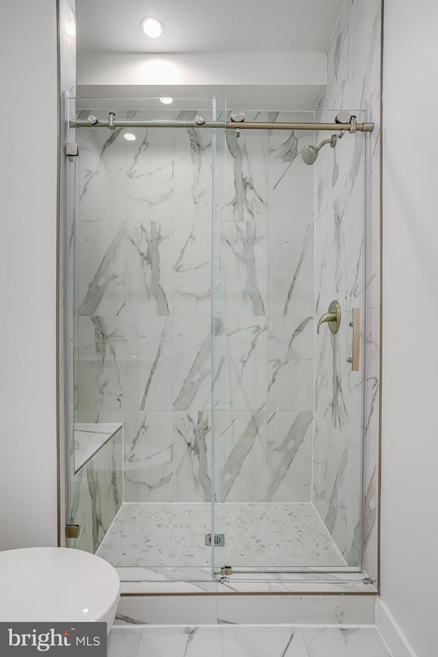 4902 D St SE, Washington, DC 20019 - bathroom with toilet, a marble finish shower, marble finish floors, and recessed lighting