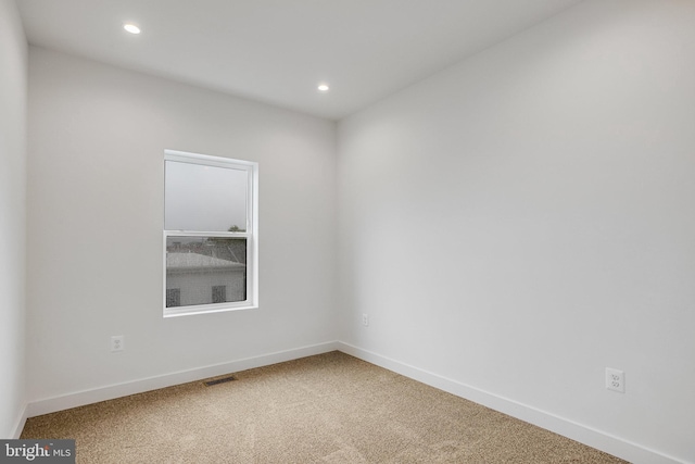 4902 D St SE, Washington, DC 20019 - empty room with carpet, recessed lighting, and baseboards