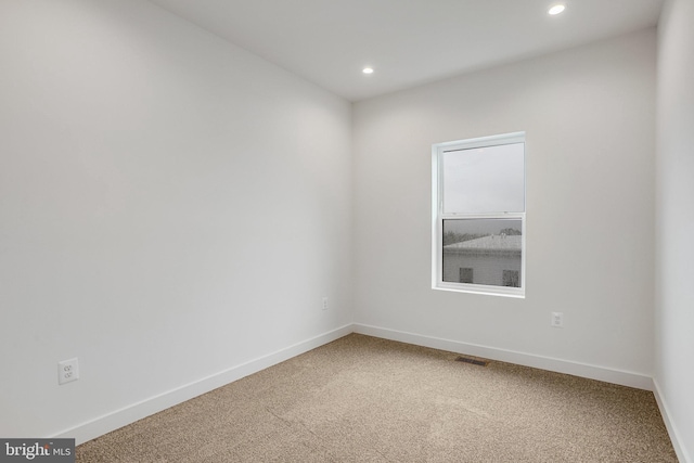 4902 D St SE, Washington, DC 20019 - carpeted empty room with recessed lighting and baseboards