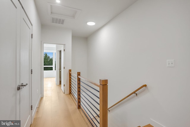 4902 D St SE, Washington, DC 20019 - hall with an upstairs landing, attic access, light wood-type flooring, recessed lighting, and baseboards