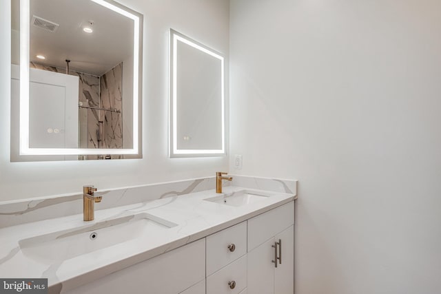 4902 D St SE, Washington, DC 20019 - bathroom with double vanity and recessed lighting