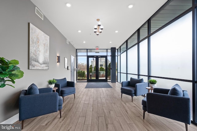 44691 Wellfleet Dr Unit 508, Ashburn, VA 20147 - common area with a wall of windows and recessed lighting